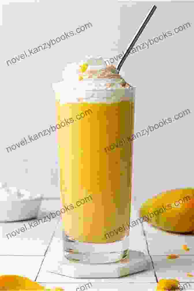 A Clear Glass Filled With Mango Milkshake Topped With A Scoop Of Coconut Ice Cream, Whipped Cream, And A Slice Of Mango Milk Shake Float Recipes: Enjoy The Smooth And Delicious Taste Of A Milkshake Or Float: How Do You Make A Simple Milkshake