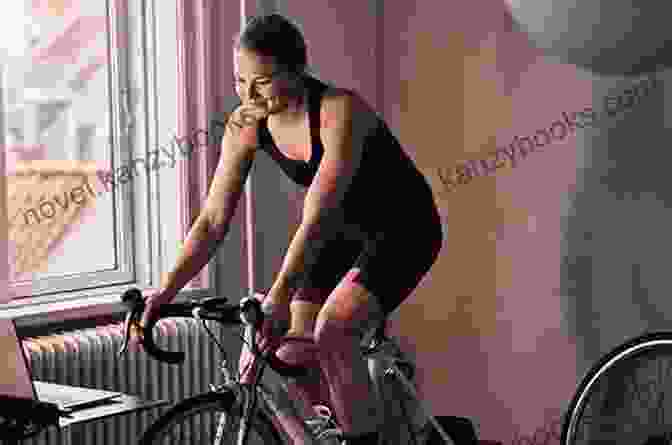 A Cyclist Training Indoors Using Advanced Equipment BICYCLE TRAINING For The TRIATHLETE: *and Others