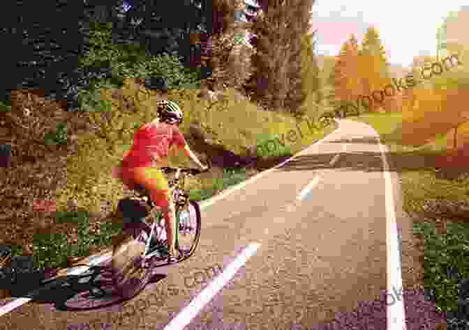 A Cyclist Training On A Scenic Road BICYCLE TRAINING For The TRIATHLETE: *and Others